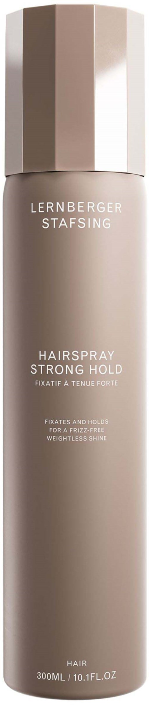 Lange beige Sprühflasche mit passendem Deckel, beschriftet 'Lernberger Stafsing Hairspray Strong Hold.'