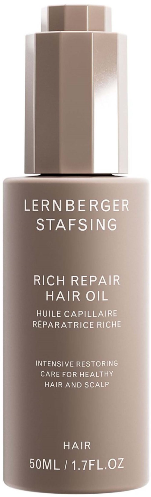 Eine Flasche Haar-Reparaturöl mit Pumpe, auf Englisch beschriftet, zur Pflege von Haar und Kopfhaut. Enthält 50 ml.