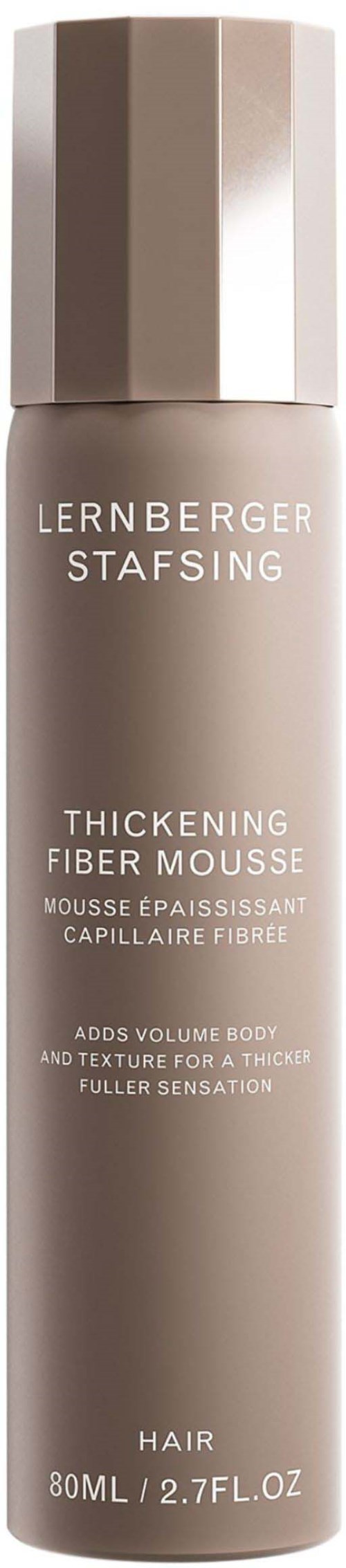 Eine lange, beiger Flasche mit der Aufschrift 'LERNBERGER STAFFING' und dem Produktnamen 'Thickening Fiber Mousse' für Haarvolumen.