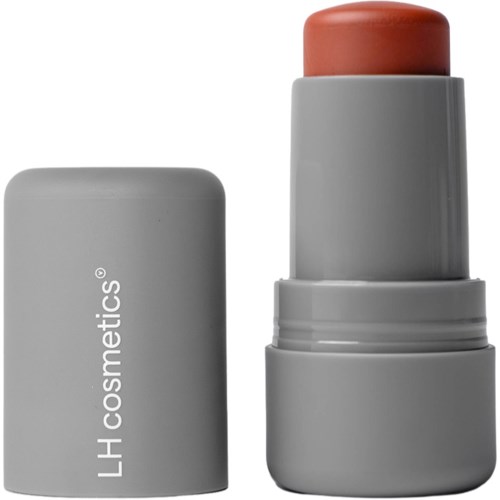 Ein graues Lippenstiftring mit einem teilweise sichtbaren pfirsichfarbenen Lippenstift. Der Ring steht aufrecht, und der Deckel trägt den Text LH cosmetics.
