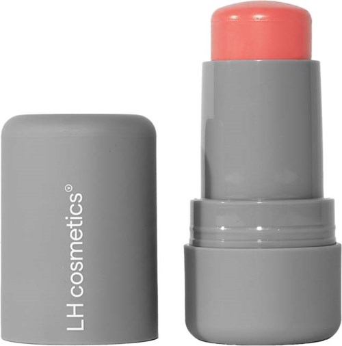 Ein grauer zylindrischer Lippenbalsam-Container mit rosa Balsam darin, beschriftet 'LH cosmetics.'