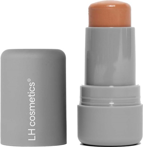 Eine graue Flasche mit Deckel, beschriftet 'LH cosmetics,' und ein beigefarbener Stift darin.
