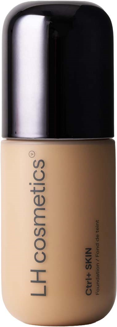 A bottle of LH Cosmetics foundation with a black cap and beige liquid inside.