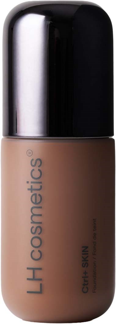 A bottle of liquid foundation with a black cap and beige packaging labeled LH cosmetics, Clear Skin, for even complexion.