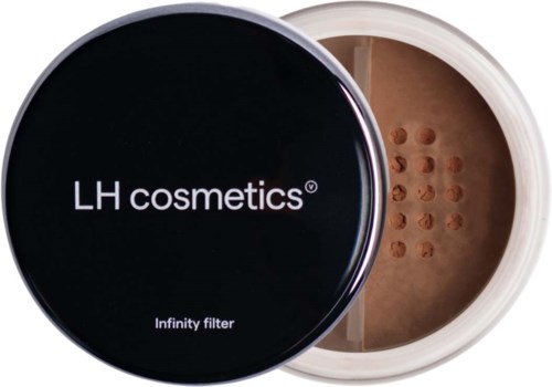 Black round container with white text for LH cosmetics and infinity filter. Inside is a powder with a textured surface.
