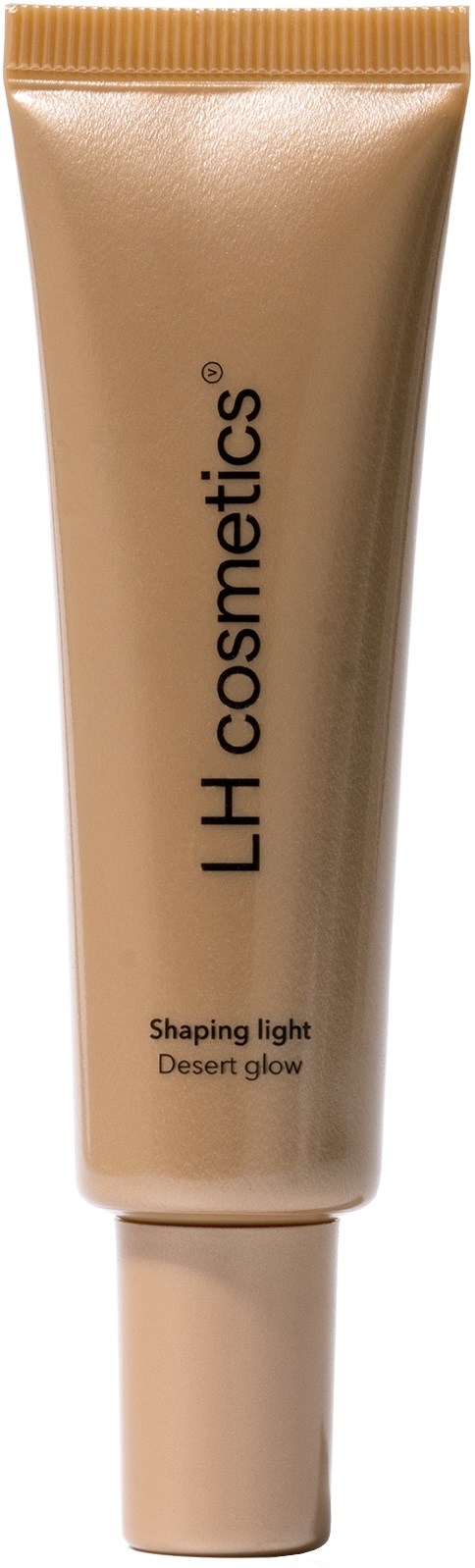 Beige putkirasi, jossa lukee 'L H cosmetics', 'Shaping light' ja 'Desert glow' kultaisella terällä.