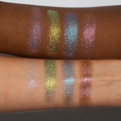 Four bright glittery colors on dark and light skin: purple, gold, blue, and pink.
