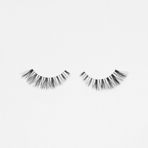 A pair of black false eyelashes on a white background.