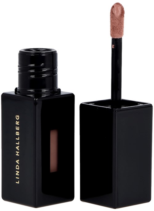 Ett svart läppstiftställ med beige läppstiftspensel, märkt 'LINDA HALLBERG'.
