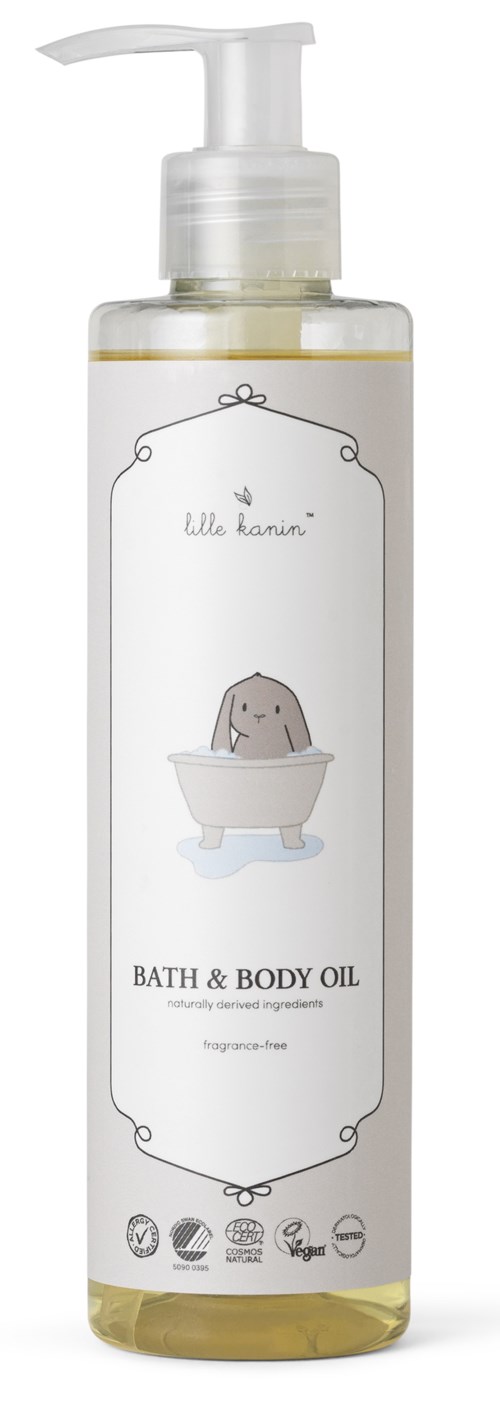 Een doorzichtige fles met bad- en lichaamsolie met pomp, met een schattige dierenillustratie in een bad.