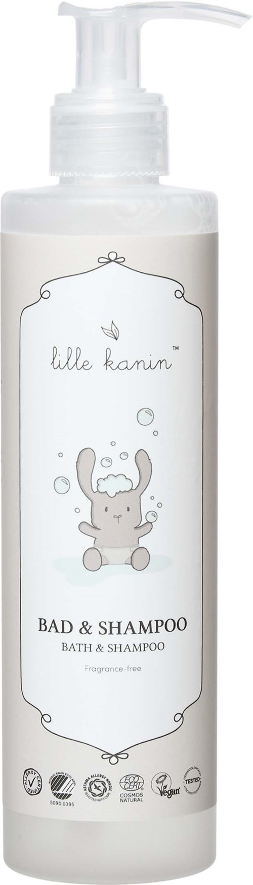 Biała butelka z pompką, oznaczona 'Bad & Shampoo,' z uroczą ilustracją królika i różnymi symbolami certyfikacji.