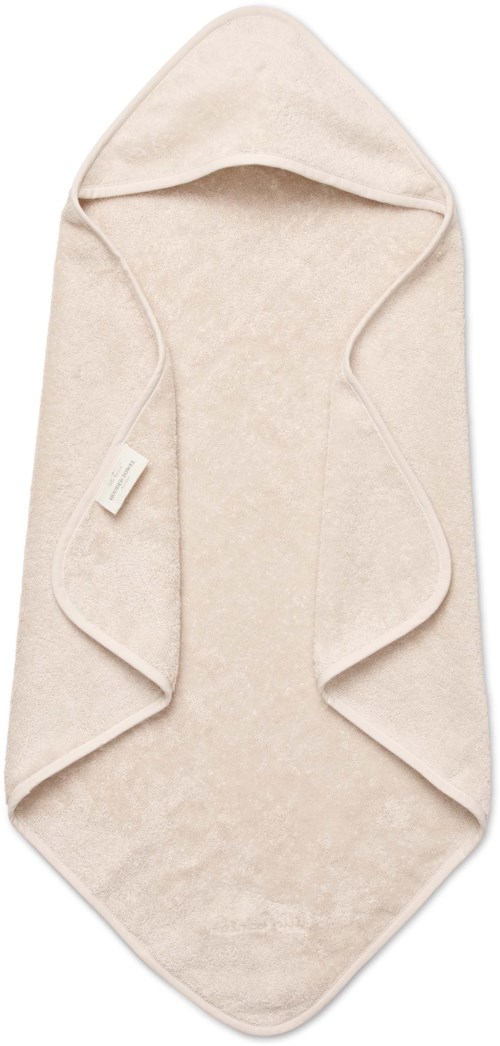 A soft, beige hooded towel with draped sides and a label, designed for babies or small children.