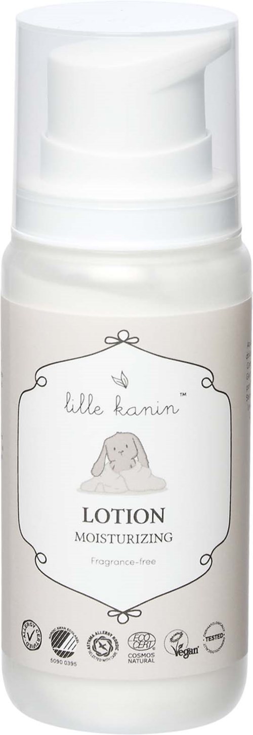 White lotion bottle with a cute dog illustration, labeled as moisturizing, fragrance-free, and eco-friendly.