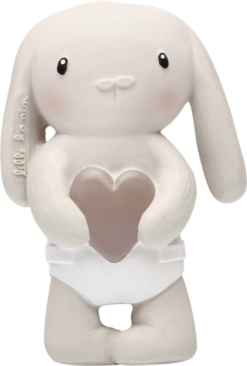 A cute bunny figurine with a heart on its belly, holding the heart, and wearing a diaper.