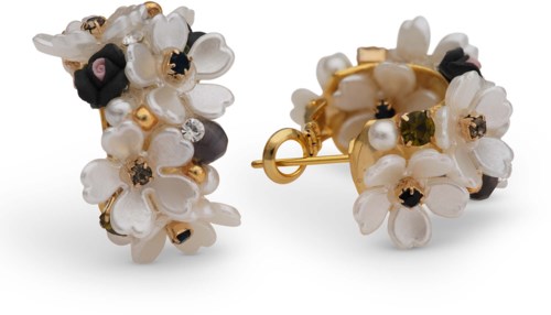 Gold earrings decorated with white, black, and pearl flowers and small sparkling stones.