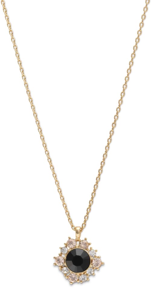 A gold necklace with a black center gemstone surrounded by small white stones.