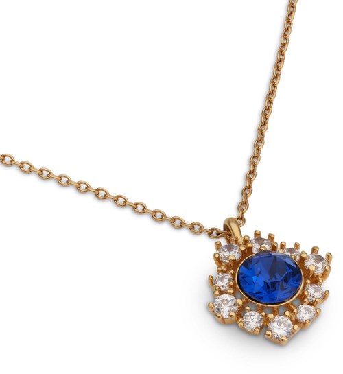 A gold chain with a blue gemstone and small clear stones in a flower shape.