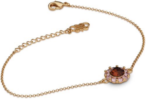 Gold bracelet with a dark red gemstone and pink stones in a flower shape.