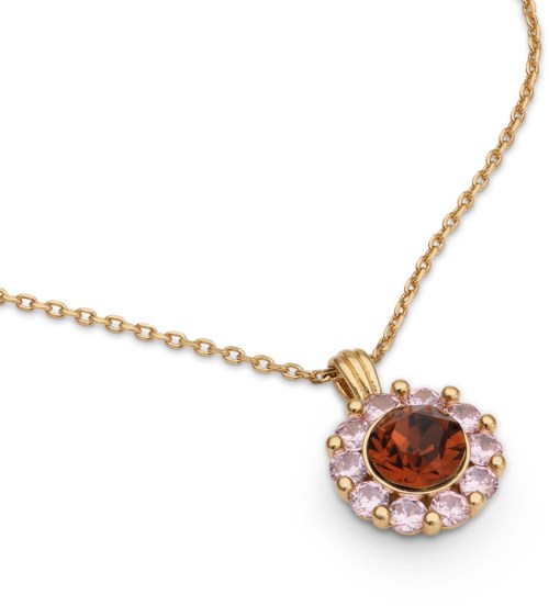 Gold chain with a round pendant featuring a large orange gemstone surrounded by small pink stones.