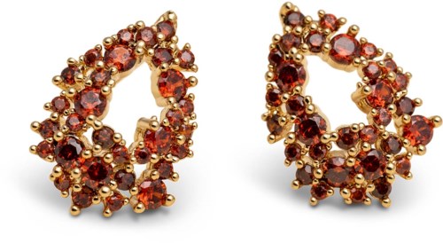 Gold hoops earrings decorated with red gemstones. Bright and shiny, they have a festive look.