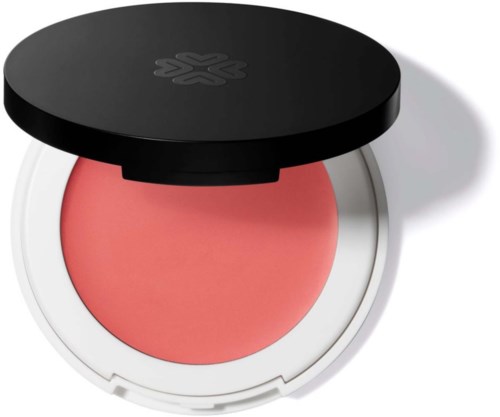 Rosa blush i rund krukke med svart lokk med blomstlogo.