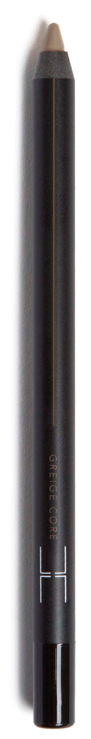 En svart makeup-penna med beige spets, används för ögon- eller läppmakeup.