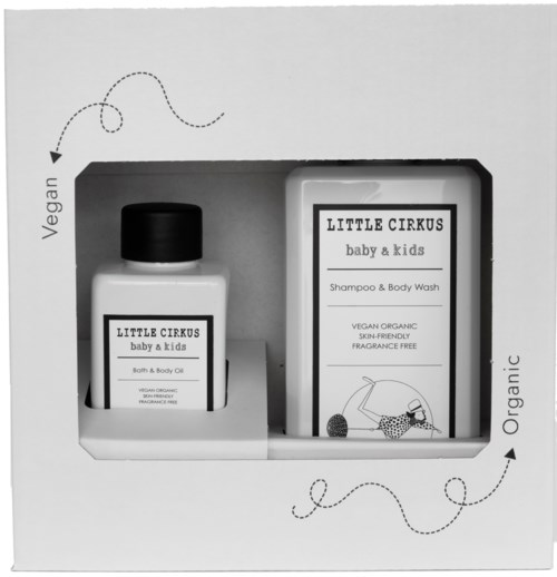 Veganistische, biologische baby shampoo en bodywash in een doos met eenvoudig ontwerp en label.