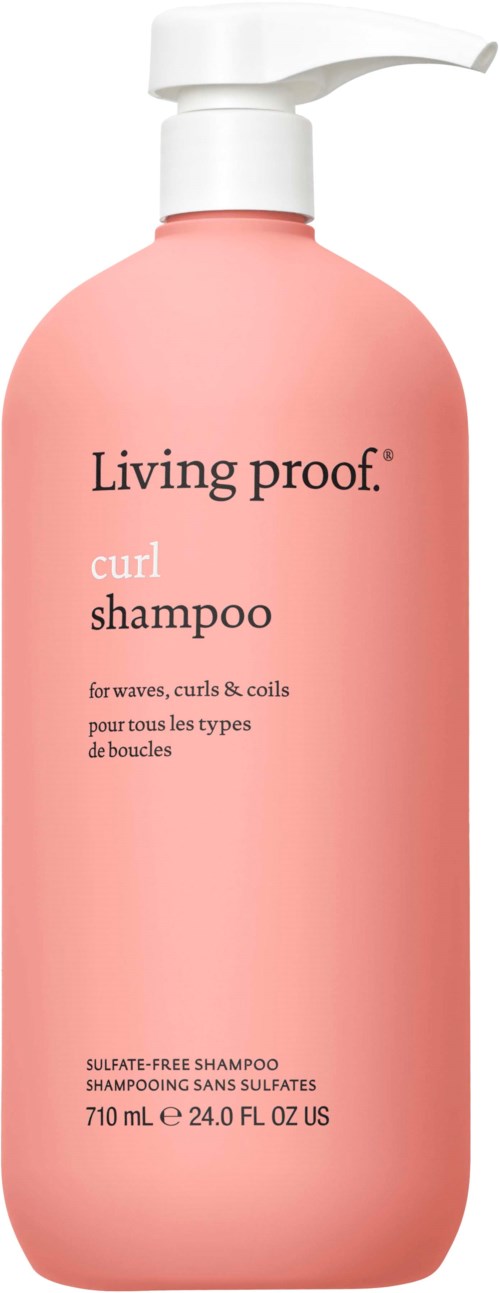 Vaaleanpunainen pullo Living Proof curl shampoolla ja pumppupäällä. Sopii aaltoilevalle hiuksille, sulfaatiton, 710 mL.