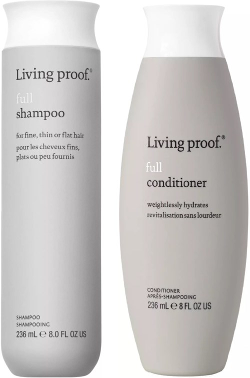 Kaksi valkoista pulloa, shampoo ja hoitoaine, Living Proof -merkiltä. Ne ovat pitkkiä ja käyriä. Molemmissa on mustaa tekstiä.