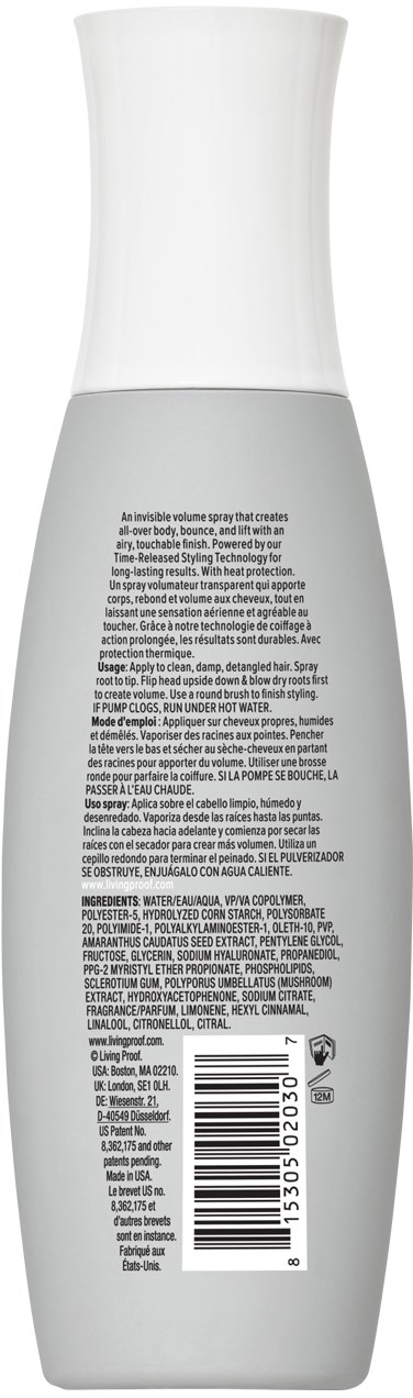A tall, white and gray bottle with text and barcode on the back. It looks like a personal care product container.