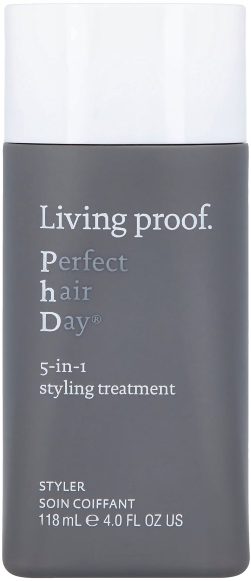 En grå flaske med hvit lokk, merket 'Living proof. Perfect hair Day 5-in-1 styling treatment'.