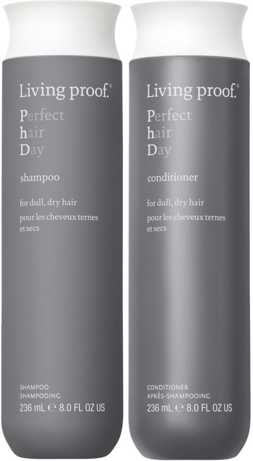 Kaksi harmaata pulloa, joissa lukee Living proof Perfect hair Day shampoo ja hoitoaine kuivahiuksisille.