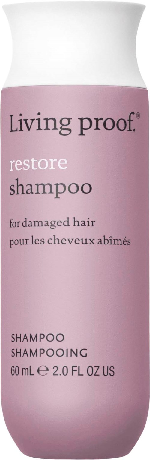 Vaaleanpunainen shampoolasi herkistyneeseen hiukseen, valkoinen korkki, nimeltään Living proof restore shampoo, 60 ml.