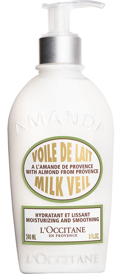 Eine weiße Lotionflasche mit Pumpkopf, beschriftet als Mandel- und Milchvorhang feuchtigkeitsspendend und glättend von L'Occitane.