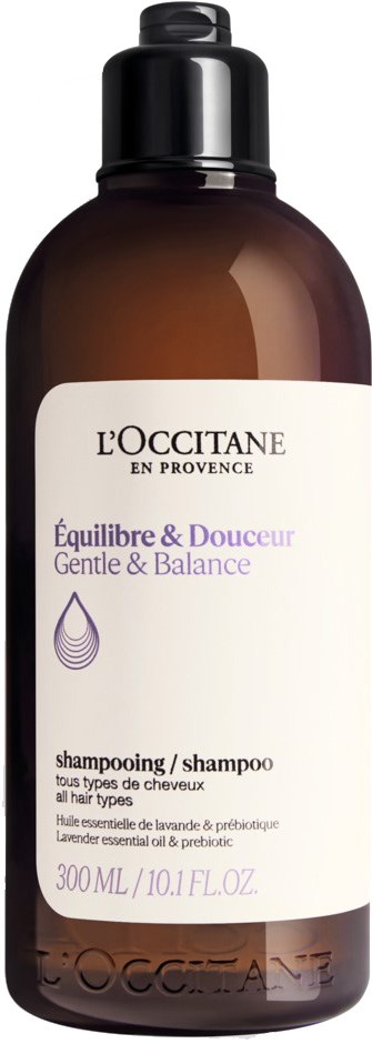 Bruine shampoofles met wit label met merk L'Occitane, genaamd Equilibre & Douceur, voor zacht haar. 300ml.