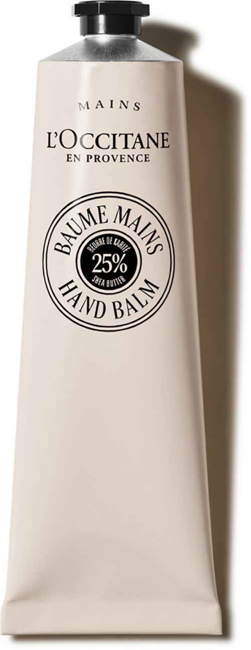 Eine weiße Tube Handbalsam mit schwarzem Verschluss, L'Occitane Provence, enthält 25% Shea-Butter.