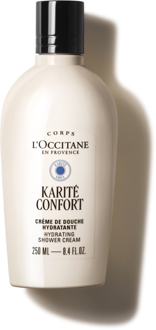 Eine weiße Flasche L'Occitane Duschcreme mit schwarzem Deckel, gekennzeichnet als feuchtigkeitsspendend und hydratisierend.