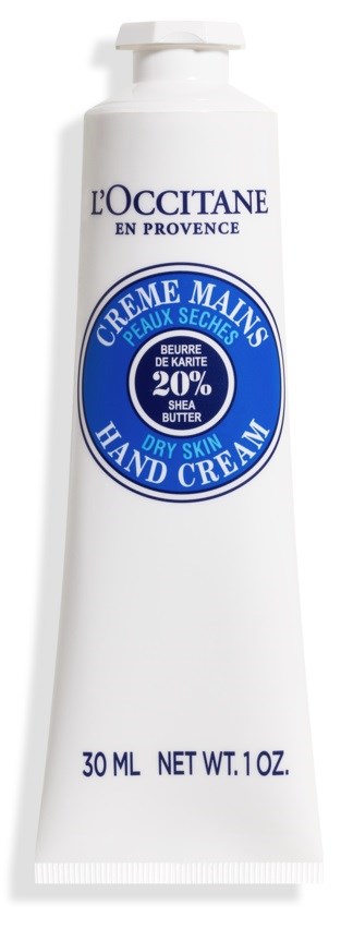 En vit handkrämstub med blå och lila text, visar att den innehåller 20% sheasmör för torr hud.