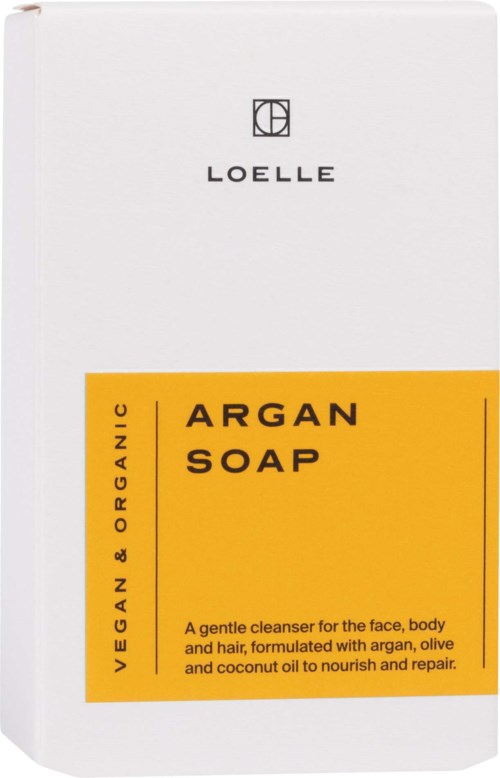 A white soap package with a yellow label that says 'Argan Soap' and describes its gentle, nourishing ingredients.