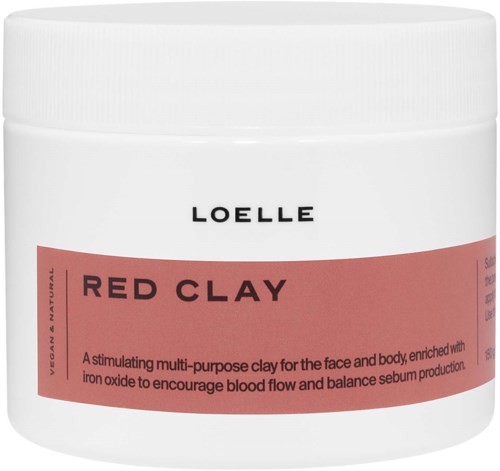 A white jar labeled Loelle Red Clay, used for face and body, enriched with iron oxide for blood flow and skin balance.
