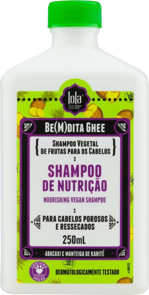 Valkoinen pullo, jossa on vihreä kansi ja värikäs etiketti. Nuo on vegaaninen ravitseva shampoo kuivalle ja huokoiselle hiukselle.