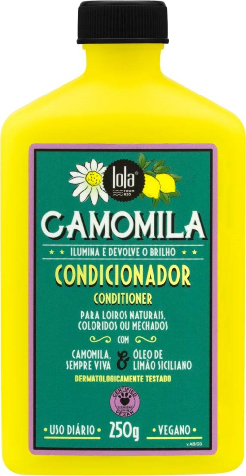 Yellow conditioner bottle with a green label, white daisy, lemon, and lime images, and various text in Portuguese.