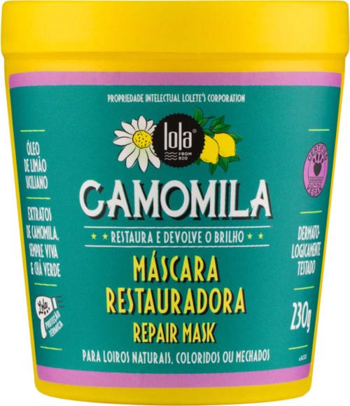 En blå behållare med gul kork, märkt 'Camomila Repair Mask' för hår, med engelska och portugisiska texter och en kamomillblomma.