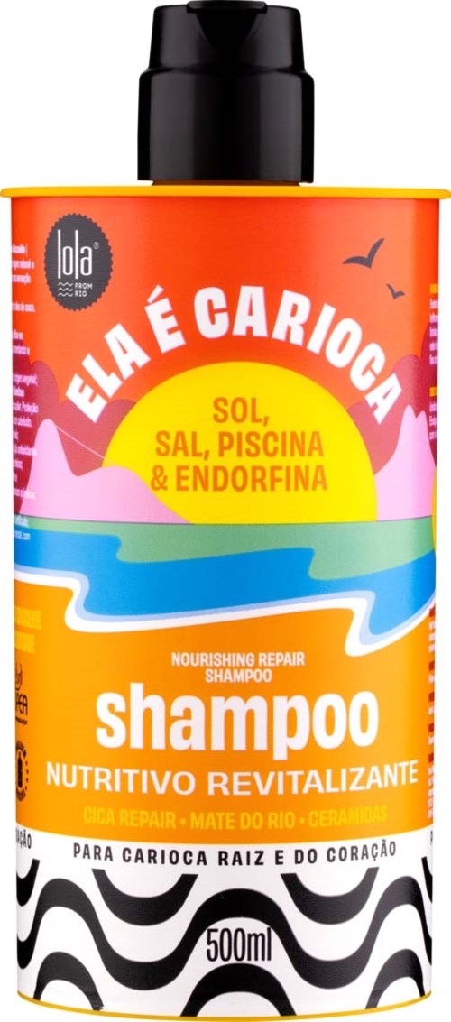 Bright orange bottle with black cap, label shows a river, sun, and birds. Text includes 'Elá é Carioca' and shampoo details.