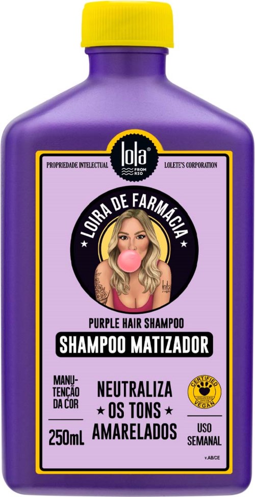 Violetti shampoopullo, jossa nainen puhaltaa vaahtokumiä, tarkoitettu hiusten sävyn tasaamiseen ja vaalentamiseen.
