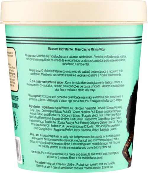 A labeled hair mask container with text about ingredient benefits and usage instructions.