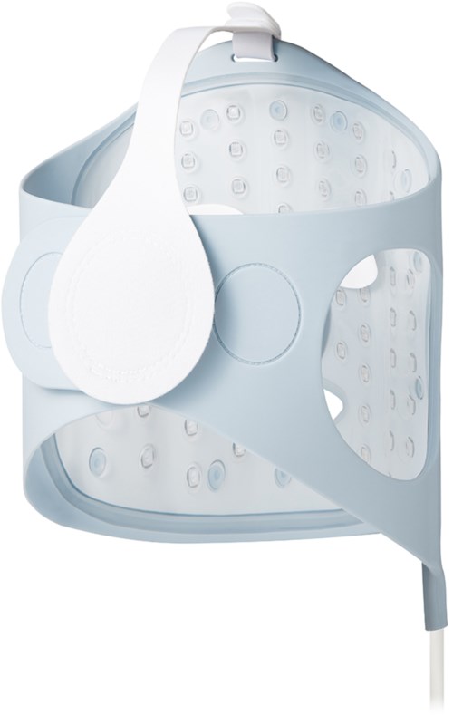A white device with ear cups and a soft headrest, designed for hair washing or scalp treatment.