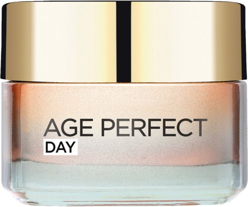 A cosmetic jar labeled Age Perfect Day with a gold lid and pastel-colored layers inside.