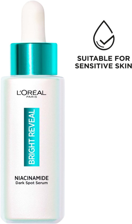 Een huidverzorgingsfles met label 'Bright Reveal', met druppel-icoon en tekst 'Geschikt voor gevoelige huid.'