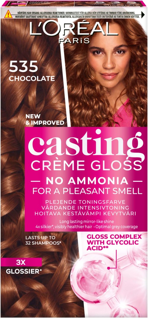 A hair dye package with a woman showing long, shiny, brown hair and various product details and claims.